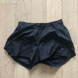 Black ASICS running shorts